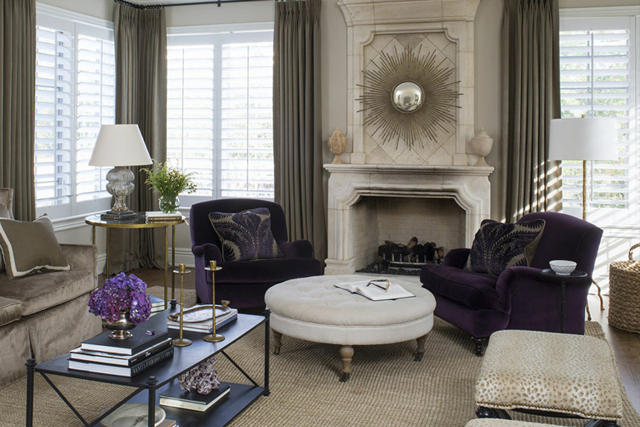 Gray curtains and white Polywood shutters on formal living room windows